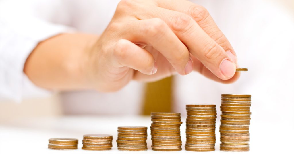 coins arranged to describe costs